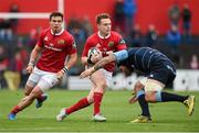 17 October 2015; Rory Scannell, Munster, is tackled by Josh Turnbull, Cardiff Blues. Guinness PRO12, Round 4, Munster v Cardiff Blues. Irish Independent Park, Cork. Picture credit: Diarmuid Greene / SPORTSFILE