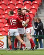 17 October 2015; Mike Sherry, Munster, celebrates with team-mates Francis Saili and Andrew Conway after scoring his side's first try. Guinness PRO12, Round 4, Munster v Cardiff Blues. Irish Independent Park, Cork. Picture credit: Diarmuid Greene / SPORTSFILE