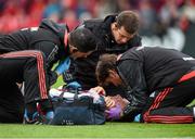 17 October 2015; Andrew Conway, Munster, receives medical attention. Guinness PRO12, Round 4, Munster v Cardiff Blues. Irish Independent Park, Cork. Picture credit: Diarmuid Greene / SPORTSFILE