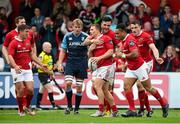 17 October 2015; Andrew Conway, Munster, celebrates with team-mates after scoring his side's fifth try. Guinness PRO12, Round 4, Munster v Cardiff Blues. Irish Independent Park, Cork. Picture credit: Diarmuid Greene / SPORTSFILE