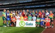 10 June 2009; At the launch of the Gala All-Ireland Camogie Championships are Joan O'Flynn, President of the Camogie Association and Denise Lord, Gala Customer Service Manager, right, holding the O'Duffy Cup, along with Senior, Intermediate and Junior players. Croke Park, Dublin. Picture credit: Pat Murphy / SPORTSFILE  *** Local Caption ***