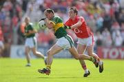 13 June 2009; Tadhg Kennelly, Kerry, in action against Paul Kerrigan, Cork. GAA Football Munster Senior Championship Semi-Final Replay, Cork v Kerry, Pairc Ui Chaoimh, Cork. Picture credit: Brendan Moran / SPORTSFILE