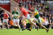 13 June 2009; Graham Canty, Cork, in action against Tadhg Kennelly, Kerry. GAA Football Munster Senior Championship Semi-Final Replay, Cork v Kerry, Pairc Ui Chaoimh, Cork. Picture credit: Brendan Moran / SPORTSFILE