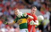 13 June 2009; Nicholas Murphy, Cork, holds off the challenge of Colm Cooper, Kerry. GAA Football Munster Senior Championship Semi-Final Replay, Cork v Kerry, Pairc Ui Chaoimh, Cork. Picture credit: Brendan Moran / SPORTSFILE