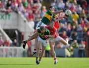 13 June 2009; Eoin Brosnan, Kerry, contests possession with Fintan Goold, Cork, above Donncha Walsh, Kerry, and Michael Shields, Cork. GAA Football Munster Senior Championship Semi-Final Replay, Cork v Kerry, Pairc Ui Chaoimh, Cork. Picture credit: Brendan Moran / SPORTSFILE
