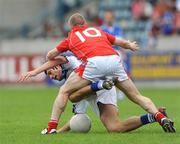 14 June 2009; Brendan Quigley, Laois, in action against Ray Finnegan, Louth. GAA Football Leinster Senior Championship Quarter-Final, Laois v Louth, Parnell Park, Dublin. Picture credit: Ray McManus / SPORTSFILE