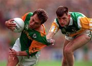 16 August 1997; Larry Carroll of Offaly in action against Brendan Reilly of Meath during the Leinster GAA Senior Football Championship Final match between Offaly and Meath at Croke Park in Dublin. Photo by Ray McManus/Sportsfile