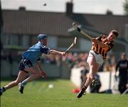 31 May 1998; Charlie Carter of Kilkenny in action against John Finnegan of Dublin during the Leinster GAA Hurling Senior Championship Quarter-Final match betwenn Dublin and Kilkenny at Parnell Park in Dublin. Photo by Brendan Moran/Sportsfile