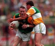 16 August 1997; Ciaran McManus of Offaly in action against Jimmy McGuinness of Meath during the Leinster GAA Senior Football Championship Final match between Offaly and Meath at Croke Park in Dublin. Photo by Ray McManus/Sportsfile