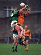 Erin's Isle v Strabbannon Parnell's Leinster Football Championship Semi Final 23/11/1997 John Barr (Erin's Isle) goes up for the ball with Ken Reilly (Strabbannon Parnell's)  Photograph Matt Browne SPORTSFILE.