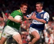 15.9.1996. Action Features Kerry's Noel Kennelly tackled by Laois Martin Delaney Kerry v Laois All Ireland Minor Final Croke Park, Dublin. Picture Credit Dave Maher/SPORTSFILE.