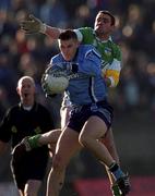 12 November 2000; Ciaran Whelan of Dublin in action against James Grennan of Offaly during the Church & General National Football League Division 1A match between Offaly and Dublin at O'Connor Park in Tullamore, Offaly. Photo by Aoife Rice/Sportsfile