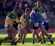 12 November 2000; Ciaran Whelan of Dublin in action against Darren Quinn and Alan McNamee of Offaly during the Church & General National Football League Division 1A match between Offaly and Dublin at O'Connor Park in Tullamore, Offaly. Photo by Aoife Rice/Sportsfile