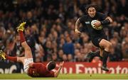 17 October 2015; Ma'a Nonu, New Zealand, escapes the tackle of Remi Tales, France. 2015 Rugby World Cup, Quarter-Final, New Zealand v France. Millennium Stadium, Cardiff, Wales. Picture credit: Stephen McCarthy / SPORTSFILE