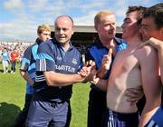 21 June 2009; Dublin manager Anthony Daly, left, and selector Richard Stakelum congratulate Simon Lambert after the match. GAA Hurling Leinster Senior Championship Semi-Final, Dublin v Wexford, Nowlan Park, Kilkenny. Picture credit: Brian Lawless / SPORTSFILE