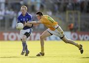 27 June 2009; Cian Mackey, Cavan, in action against Niall McKeever, Antrim. GAA Football Ulster Senior Championship Semi-Final, Antrim v Cavan, St. Tighearnach's Park, Clones, Co. Monaghan. Picture credit: Oliver McVeigh / SPORTSFILE