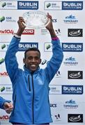 26 October 2015; Overall winner Alemu Gemechu, Ethiopia, with the trophy after the SSE Airtricity Dublin Marathon 2015. Dublin. Picture credit: Cody Glenn / SPORTSFILE