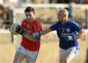 1 November 2015; Lee Brennan, Trillick, in action against Aaron Thompson,  Naomh Conaill, AIB Ulster GAA Senior Club Football Championship Quarter-Finals, Naomh Conaill v Trillick. Pairc MacCumhaill, Ballybofey, Donegal.  Picture credit: Oliver McVeigh / SPORTSFILE