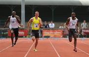 4 July 2009; Paul Hession, Ireland, 4, who finished second in action against eventual winner Brendan Christian, Antigua, right, and third placed Chris Craig, left, during the Cork City Sports Men's 100m. The Mardyke, Cork. Picture credit: Pat Murphy / SPORTSFILE