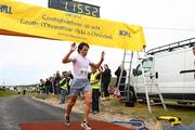 4 July 2009; Patrick MacCriostail crosses the line to win the 2009 Achill Half Marathon. Achill Island, Co. Mayo. Picture credit: Tomas Greally / SPORTSFILE