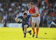 4 July 2009; Mark Downey, Monaghan, in action against Andy Mallon, Armagh. GAA Football Ulster All-Ireland Senior Championship Qualifier, Round 1, Monaghan v Armagh, St. Tighearnach's Park, Clones, Co. Monaghan. Picture credit: Oliver McVeigh / SPORTSFILE