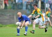 4 July 2009; Padraig Berry, Longford, in action against Barry Prior, Leitrim. GAA Football All-Ireland Senior Championship Qualifier, Round 1, Leitrim v Longford, Pairc Sean Mac Diarmada, Carrick-on-Shannon, Co. Leitrim. Picture credit: David Maher / SPORTSFILE