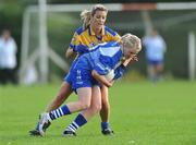 4 July 2009; Mairead Wall, Waterford, in action against Michelle Delaney, Clare. TG4 Ladies Football Munster Intermediate Championship Final, Clare v Waterford, Bruff, Co. Limerick. Picture credit: Diarmuid Greene / SPORTSFILE