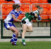 4 July 2009; Sharon McGovern, Fermanagh, in action against Eilish Cornyn, Cavan. TG4 Ladies Football Ulster Intermediate Championship Final, Cavan v Fermanagh, Athletic Grounds, Armagh. Picture credit: Michael Cullen / SPORTSFILE