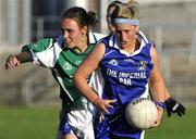 4 July 2009; Donna English, Cavan, in action against Adele Gallagher, Fermanagh. TG4 Ladies Football Ulster Intermediate Championship Final, Cavan v Fermanagh, Athletic Grounds, Armagh. Picture credit: Michael Cullen / SPORTSFILE