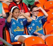 4 July 2009; Nheaca Smyth, left, and Marie Owens, from Laghy, Co. Cavan, enjoy the game. TG4 Ladies Football Ulster Intermediate Championship Final, Cavan v Fermanagh, Athletic Grounds, Armagh. Picture credit: Michael Cullen / SPORTSFILE