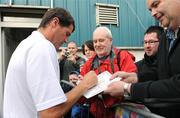 7 July 2009; Ipswich Town manager Roy Keane signs autographs on his arrival at Finn Park. Pre-season Friendly, Finn Harps v Ipswich Town, Finn Park, Ballybofey, Co. Donegal. Photo by Sportsfile