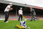 8 July 2009; Bohemians players Paddy Madden, left, and Anto Murphy with Leslie Buckley, founder of Haven, at an announcement of the club's support of house-building in Haiti. Dalymount Park, Phibsborough, Dublin. Picture credit: Pat Murphy / SPORTSFILE