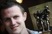 8 July 2009; Antrim footballer Michael McCann with his Vodafone GAA Player of the Month Award for June. McCann was one of the power-houses behind Antrim's surge to their first Ulster final in 39 years. Waterford's John Mullane received the Vodafone GAA Player of the Month Award for Hurling. Westbury Hotel, Dublin. Picture credit: Brian Lawless / SPORTSFILE