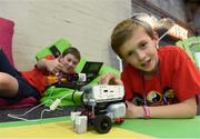 3 November 2015; Andrea Rizzi, left, and James Heavey, both aged 11 and  both from Dalkey, Co. Dublin, at the CoderDojo stand in the Machine Summitt during Day 1 of the 2015 Web Summit in the RDS, Dublin, Ireland. Photo by Sportsfile / Web Summit