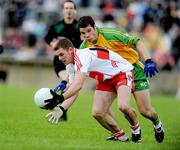 18 July 2009; Brian Mullan, Derry, in action against Kevin Cassidy, Donegal. GAA All-Ireland Senior Football Championship Qualifier, Round 3, Donegal v Derry, MacCumhaill Park, Ballybofey, Co. Donegal. Picture credit: Oliver McVeigh / SPORTSFILE