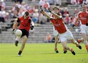 19 July 2009; Darragh O'Hanlan, Down, in action against Gavin McParland, Armagh. ESB Ulster Minor Football Championship Final, Armagh v Down, St Tighearnach's Park, Clones, Co. Monaghan. Picture credit: Oliver McVeigh / SPORTSFILE