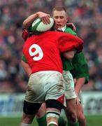 1 April 2000; Peter Stringer of Ireland is tackled by Rupert Moore of Wales during the Lloyds TSB 6 Nations match between Ireland and Wales at Lansdowne Road in Dublin. Photo by Matt Browne/Sportsfile