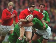 1 April 2000; Shane Williams of Wales is tackled by Andy Ward, right, and John Hayes of Ireland during the Lloyds TSB 6 Nations match between Ireland and Wales at Lansdowne Road in Dublin. Photo by Brendan Moran/Sportsfile