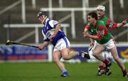 4 November 2000; David Cuddy of Castletown in action against Johnny Pilkington of Birr during the AIB Leinster Club Hurling Championship Quarter-Final match between Castletown and Birr at O'Moore Park in Portlaoise, Laois. Photo by Ray McManus/Sportsfile