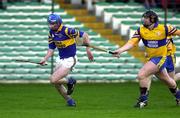 19 November 2000; Paul O'Grady of Patrickswell in action against Pat Hayes of Sixmilebridge during the AIB Munster Senior Hurling Club Championship Semi-Final match between Patrickswell and Sixmilebridge at the Gaelic Grounds in Limerick. Photo by Damien Eagers/Sportsfile