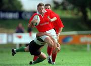 12 September 1998; Killian Keane of Munster is tackled by Simon Allnutt of Connacht during the Guinness Interprovincial Rugby Championship match between Munster and Connacht at Dooradoyle in Limerick. Photo by Matt Browne/Sportsfile