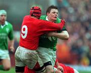 1 April 2000; Brian O'Driscoll of Ireland is tackled by Rupert Moon of Wales during the Lloyds TSB 6 Nations match between Ireland and Wales at Lansdowne Road in Dublin. Photo by Brendan Moran/Sportsfile