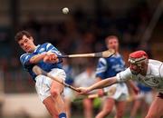 17 March 2000; Greg Baker of St Joseph's Doorabarefield in action against John Feeney of St Mary's Athenry during the AIB All-Ireland Senior Club Hurling Championship Final match between Athenry and St Joseph's Doorabarefield at Croke Park in Dublin. Photo by Damien Eagers/Sportsfile