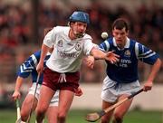 17 March 2000; Paul Hardiman of St Mary's Athenry in action against Greg Baker of St Joseph's Doorabarefield during the AIB All-Ireland Senior Club Hurling Championship Final match between Athenry and St Joseph's Doorabarefield at Croke Park in Dublin. Photo by Damien Eagers/Sportsfile