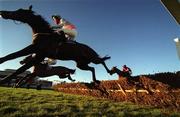 14 January 2001; Lawz, with Paul Carberry up, leads the field over the last hurdle first time around in the Pierse Hurdle during Horse Racing from Leopardstown Racecourse in Dublin. Photo By Brendan Moran/Sportsfile