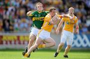 26 July 2009; Aaron Douglas, Antrim, in action against Darran O'Sullivan, Kerry. GAA All-Ireland Senior Football Championship Qualifier Round 4, Antrim v Kerry, O'Connor Park, Tullamore, Co. Offaly. Picture credit: Brendan Moran / SPORTSFILE