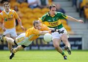 26 July 2009; Declan O'Sullivan, Kerry, in action against Colin Brady, Antrim. GAA All-Ireland Senior Football Championship Qualifier Round 4, Antrim v Kerry, O'Connor Park, Tullamore, Co. Offaly. Picture credit: Brendan Moran / SPORTSFILE