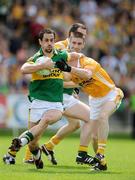 26 July 2009; Paul Galvin, Kerry, in action against Ciaran Close, Antrim. GAA All-Ireland Senior Football Championship Qualifier Round 4, Antrim v Kerry, O'Connor Park, Tullamore, Co. Offaly. Picture credit: Brendan Moran / SPORTSFILE