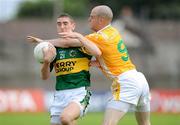 26 July 2009; Killian Young, Kerry, in action against Aodhan Gallagher, Antrim. GAA All-Ireland Senior Football Championship Qualifier Round 4, Antrim v Kerry, O'Connor Park, Tullamore, Co. Offaly. Picture credit: Brendan Moran / SPORTSFILE