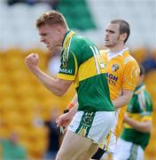 26 July 2009; Tommy Walsh, Kerry, celebrates after scoring his side's first goal as Colin Brady, Antrim, looks on. GAA All-Ireland Senior Football Championship Qualifier Round 4, Antrim v Kerry, O'Connor Park, Tullamore, Co. Offaly. Picture credit: Brendan Moran / SPORTSFILE